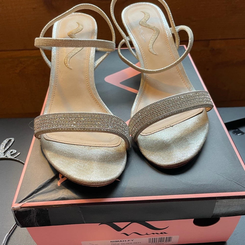 Elegance comes easy with the Nina silver With rhinestones size 9